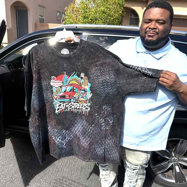 Customer wearing a custom shirt printed for a Las Vegas event